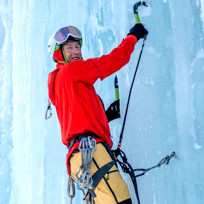 Tim Macartney Snape climbing on an ice wall.